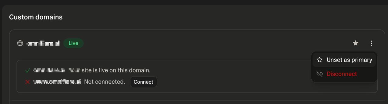 Unset custom domain as primary in Lovable.dev